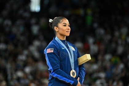 American gymnast Jordan Chiles poses during the women's floor exercise medal ceremony at the Paris 2024 Olympic Games.