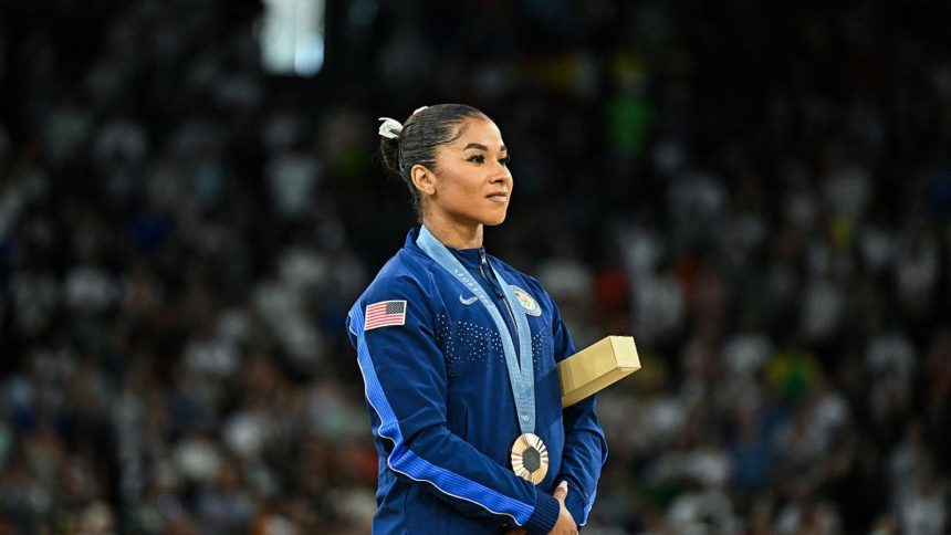 American gymnast Jordan Chiles poses during the women's floor exercise medal ceremony at the Paris 2024 Olympic Games.