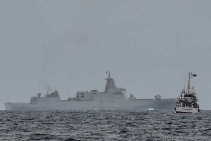 A vessel identified by the Philippine Coast Guard as a Chinese naval ship operates in the South China Sea on August 26.