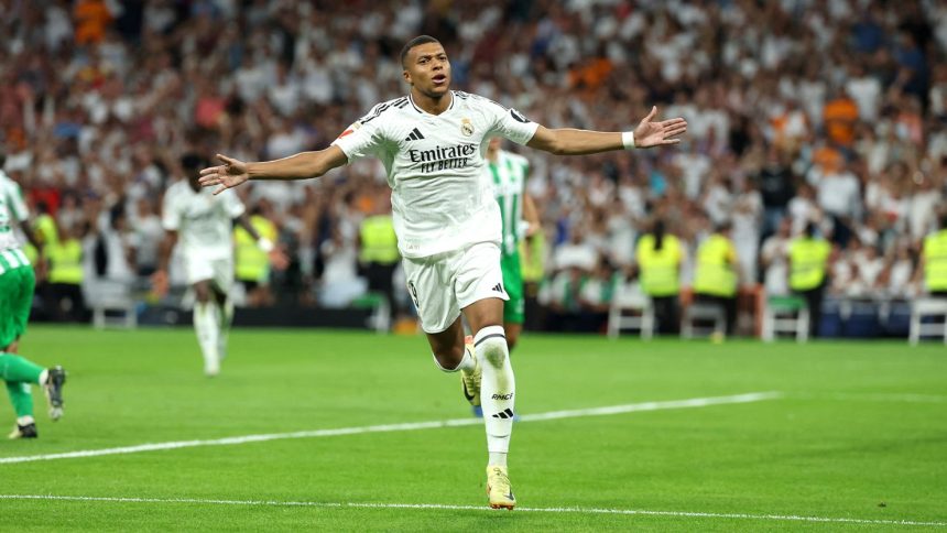 Mbappé celebrates scoring from the penalty spot against Real Betis.