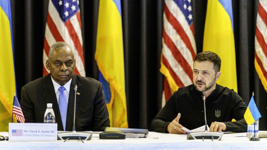 Zelensky (right) with US Secretary of Defense Lloyd Austin at the Friday meeting.