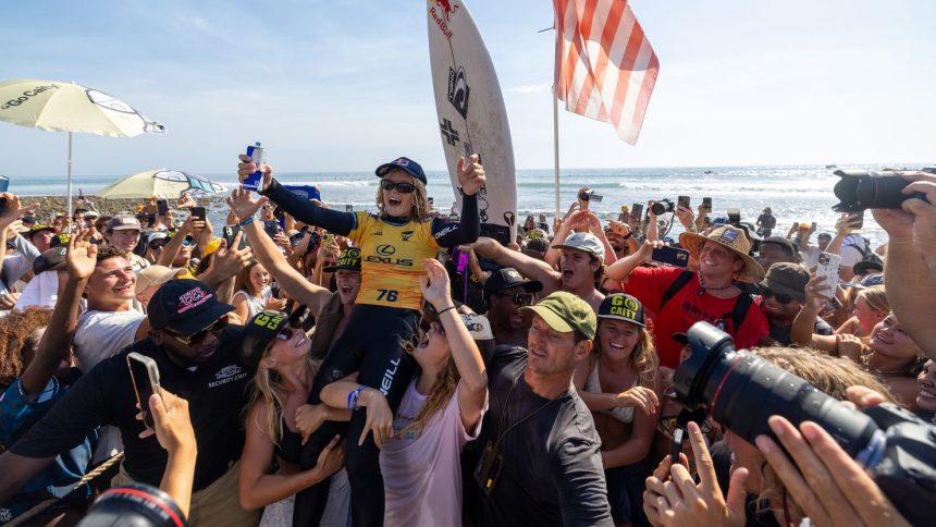 Caitlin Simmers is carried on the beach after beating Caroline Marks to win the WSL Finals.