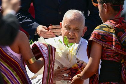 Pope Francis is greeted at Presidente Nicolau Lobato International Airport in Dili, East Timor, on September 9, 2024.