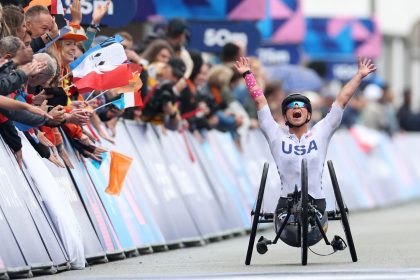 PARIS, FRANCE - SEPTEMBER 05: Gold medalist, Oksana Masters of Team United States celebrates winning during the Women's H5 Road Race on day eight of the Paris 2024 Summer Paralympic Games at on September 05, 2024 in Paris, France. (Photo by Michael Steele/Getty Images)