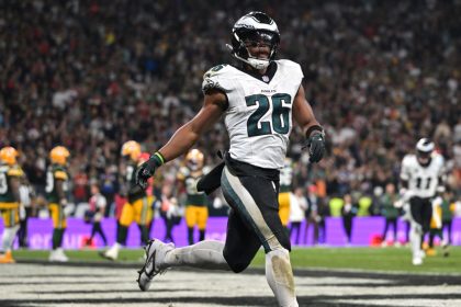 Philadelphia Eagles running back Saquon Barkley celebrates after a touchdown during the second quarter against the Green Bay Packers.