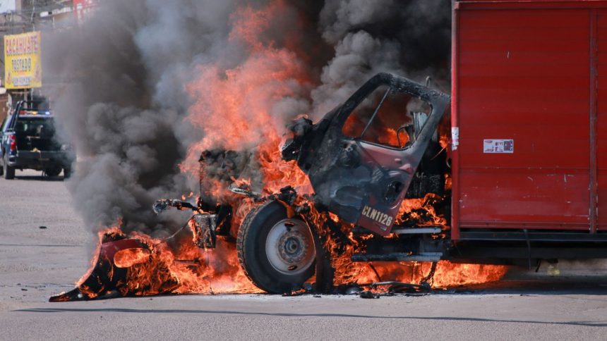 A truck on fire is seen on the streets of Culiacan, Sinaloa State, Mexico, on September 11, 2024.