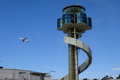 A plane leaves Sydney Airport in Australia.