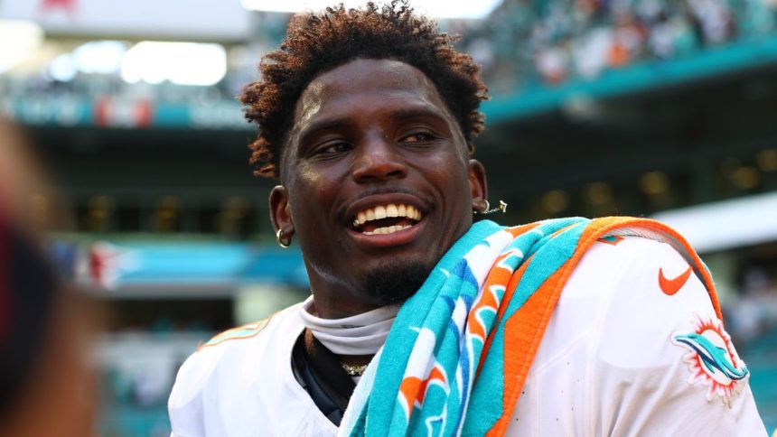 MIAMI GARDENS, FLORIDA - SEPTEMBER 08: Tyreek Hill #10 of the Miami Dolphins reacts after his team's 20-17 win against the Jacksonville Jaguars at Hard Rock Stadium on September 08, 2024 in Miami Gardens, Florida. (Photo by Megan Briggs/Getty Images)