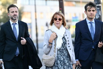 Gisele Pelicot (center) insisted on a public trial to expose her husband and the other men accused of raping her.