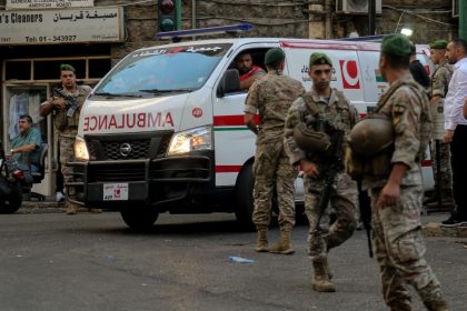 Lebanese troops secure a Beirut street following the explosions on September 17, 2024.