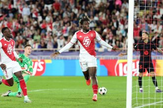 Monaco's George Ilenikhena celebrates after scoring against Barcelona at the Stade Louis II.