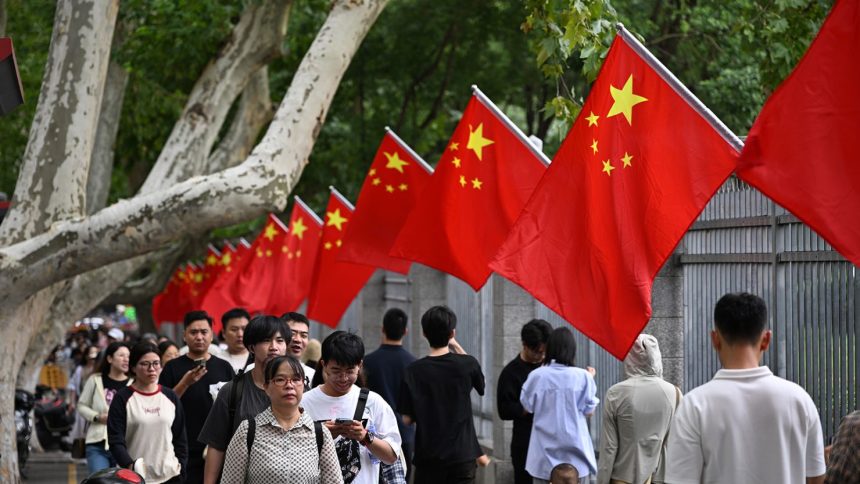 National flags are displayed on the streets of of Nanjing, eastern China, to celebrate the 75th anniversary of the founding of the People's Republic.