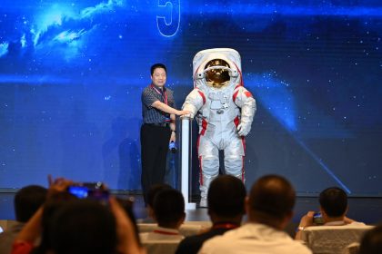 Yang Liwei, deputy chief designer of China's manned space program, unveils China's moon-landing spacesuit on September 28, 2024 in the southwestern metropolis of Chongqing.