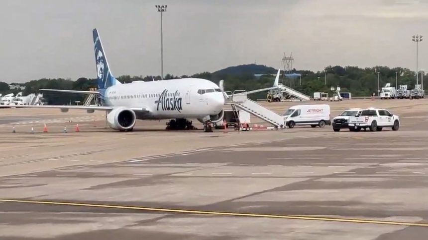 Alaska Airlines flight seen with tire damage after an incident at Nashville International Airport in Nashville, Tennessee, on September 12, 2024.