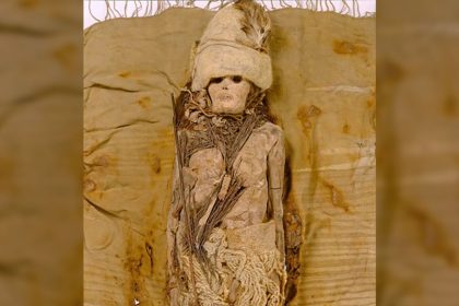 A mummy from the Xiaohe cemetery in the arid Tarim Basin, in China’s Xinjiang region, is seen with kefir cheese scattered around the neck.