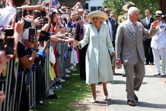 King Charles III and Queen Camilla speak to wellwishers after attending a Sunday church service at St Thomas' Anglican Church in north Sydney on day one of their visit to Australia and Samoa, on Sunday October 20, 2024.