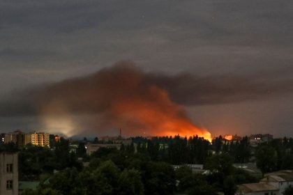 Smoke rises during a Russian drone strike on the city of Kherson on July 26, 2024.