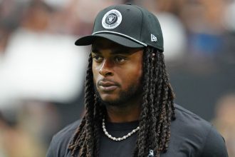 Sep 29, 2024; Paradise, Nevada, USA; Las Vegas Raiders wide receiver Davante Adams (17) walks the sideline before the start of a game between the Raiders and the Cleveland Browns at Allegiant Stadium. Mandatory Credit: Stephen R. Sylvanie-Imagn Images