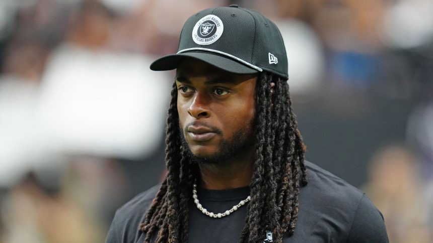 Sep 29, 2024; Paradise, Nevada, USA; Las Vegas Raiders wide receiver Davante Adams (17) walks the sideline before the start of a game between the Raiders and the Cleveland Browns at Allegiant Stadium. Mandatory Credit: Stephen R. Sylvanie-Imagn Images