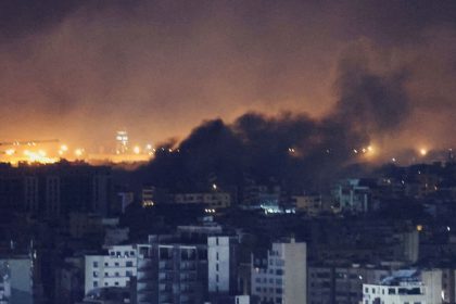 Smoke rises over Beirut's southern suburbs after a strike, as seen from Sin El Fil, Lebanon, on Tuesday, October 1.