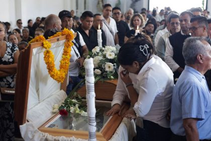 Mourners pay their respects at the casket of Alejandro Arcos, the mayor of Chilpancingo who was killed on Sunday less than a week after taking office.