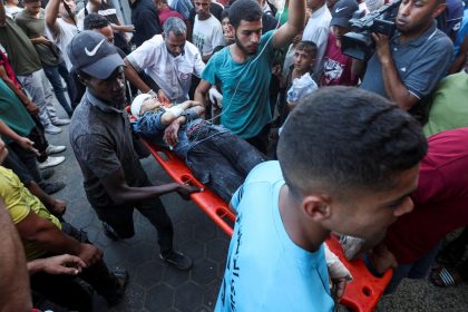 A wounded Palestinian is carried to Al-Aqsa Martyrs Hospital, in the aftermath of an Israeli strike amid the Israel-Hamas conflict, in Deir Al-Balah, central Gaza Strip on Thursday.