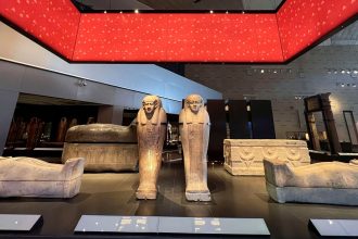 Pharaonic statues on display at the Grand Staircase of the Grand Egyptian Museum, which partially opened this week.