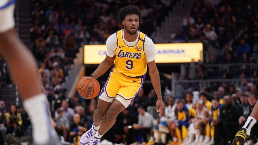 Oct 18, 2024; San Francisco, California, USA; Los Angeles Lakers guard Bronny James (9) dribbles the ball against the Golden State Warriors in the second quarter at the Chase Center. Mandatory Credit: Cary Edmondson-Imagn Images