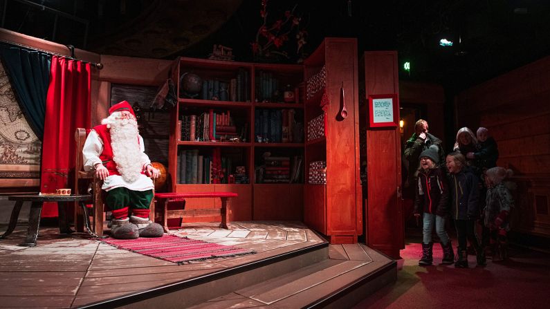 Rovaniemi, Lapland, Finland: Santa Claus meets with children at his office near Rovaniemi. Located in Lapland, Rovaniemi's Santa Claus Village amusement park is a snow-covered wonderland of reindeer rides, ice castles, snowmobiles and igloo hotels where Christmas holds sway 365 days a year.