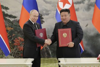 North Korean leader Kim Jong Un and Russia's President Vladimir Putin shake hands after signing a comprehensive strategic partnership in Pyongyang, North Korea in June this year.