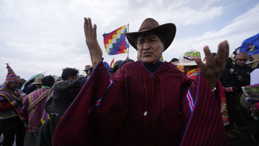 Former President Evo Morales, center, marches to La Paz with supporters to protest current President Luis Arce, near El Alto, Bolivia, Sunday, Sept. 22, 2024. (AP Photo/Juan Karita)