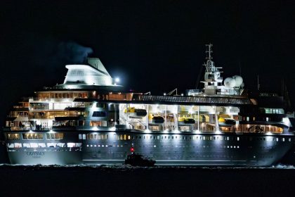 The Villa Vie Odyssey cruise ship leaves Belfast Harbor in Belfast, Northern Ireland, on September 30.