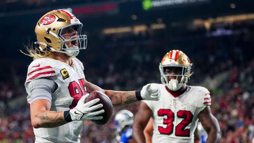 Tight end George Kittle (left) scored a fourth-quarter touchdown as the San Francisco 49ers beat the Seattle Seahawks on Thursday Night Football.