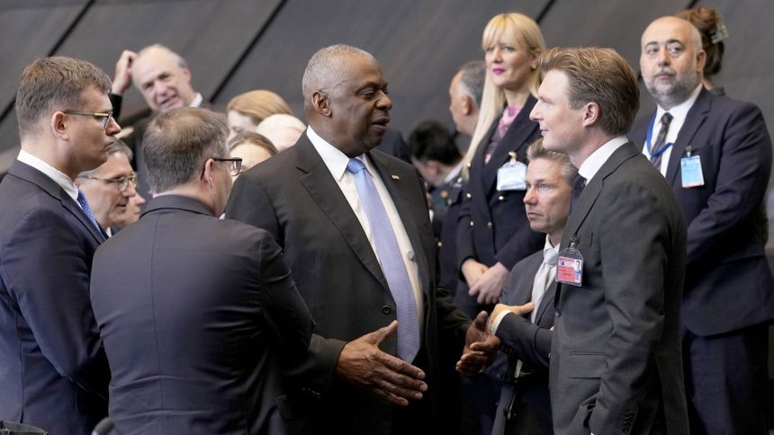 United States Secretary of Defense Lloyd Austin, center, speaks with Netherland's Defense Minister Ruben Brekelmans, third right, and Sweden's Defense Minister Pal Jonson, fourth right, during a meeting of the North Atlantic Council in NATO defense ministers format at NATO headquarters in Brussels, Friday, Oct. 18, 2024. (AP Photo/Virginia Mayo)