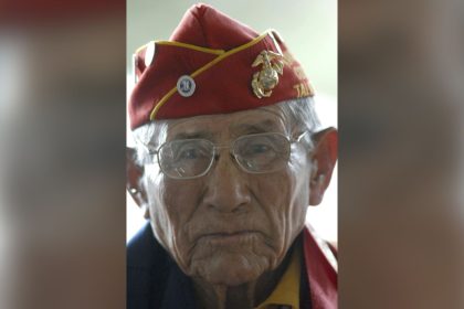 Navajo Code Talker John Kinsel Sr. listens as his comrades speak of their WWII experiences on August 14, 2007, in Window Rock, Arizona.