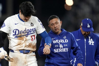 Los Angeles Dodgers' Shohei Ohtani will play in Game 3 of the World Series.