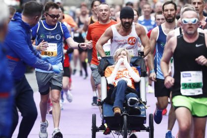 Actor Colin Farrell ran the final 4 kilometers of the Irish Life Dublin Marathon 2024 while pushing close friend Emma Fogarty.