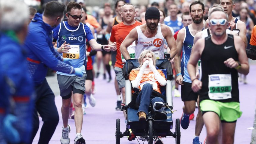 Actor Colin Farrell ran the final 4 kilometers of the Irish Life Dublin Marathon 2024 while pushing close friend Emma Fogarty.