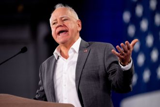 Minnesota Gov. Tim Walz speaks at a rally at York Exposition Center UPMC Arena on October 2 in York, Pennsylvania.