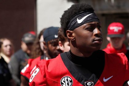 In this April 13 photo, Georgia wide receiver Colbie Young arrives with the team before the start of the G-Day spring football game in Athens, Georgia.