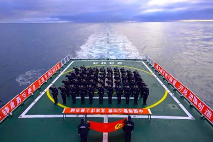 Members of the China Coast Guard stand in formation during a joint patrol with Russia that China says entered the Arctic Ocean.