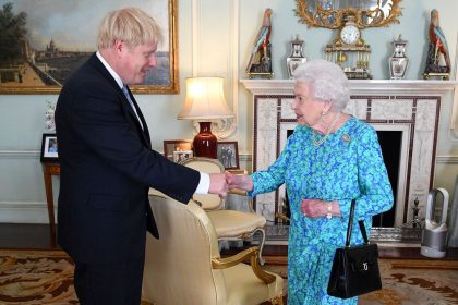 Britain's Queen Elizabeth II with Boris Johnson  during an audience in Buckingham Palace on July 24, 2019, shortly after his Conservative Party won in the UK general election.