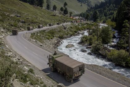 An Indian army convoy drives towards Leh, Ladakh on a highway bordering China in September 2020.