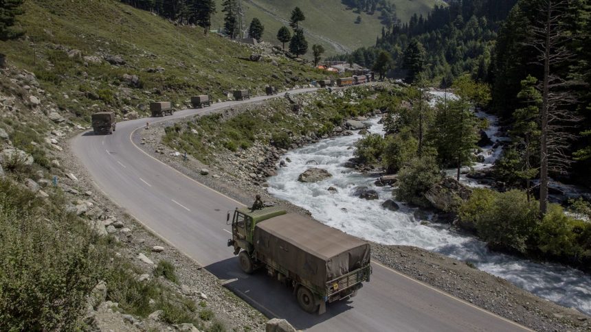 An Indian army convoy drives towards Leh, Ladakh on a highway bordering China in September 2020.