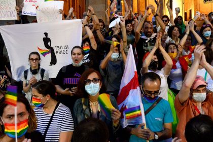 Participants hold rainbow flags during a rally in support of those who were injured when a pride march was disrupted by members of violent groups, in Tbilisi, Georgia on July 6, 2021.