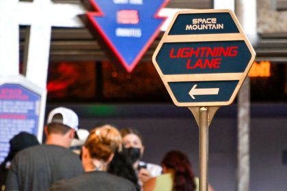 Folks line up in the Lightning Lane at Space Mountain at Disneyland in California in August 2022.