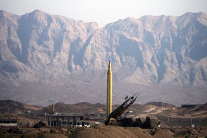 An Iranian Shahab-3 missile is seen before being tested from desert terrain at an unspecified location in Iran on September 28, 2009.