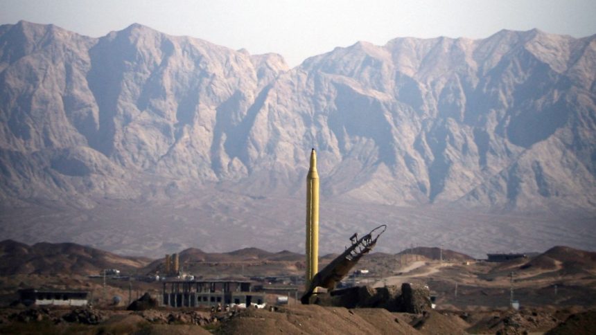 An Iranian Shahab-3 missile is seen before being tested from desert terrain at an unspecified location in Iran on September 28, 2009.