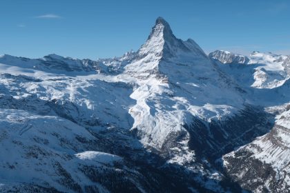 The Matterhorn mountain looms above the valley that includes the village of Zermatt on January 7, 2022 near Zermatt, Switzerland.