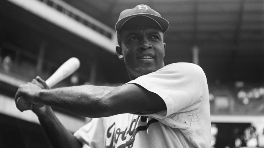 Jackie Robinson, the first Black player in Major League Baseball, ahead of a game against the Pittsburgh Pirates on August 28, 1949.